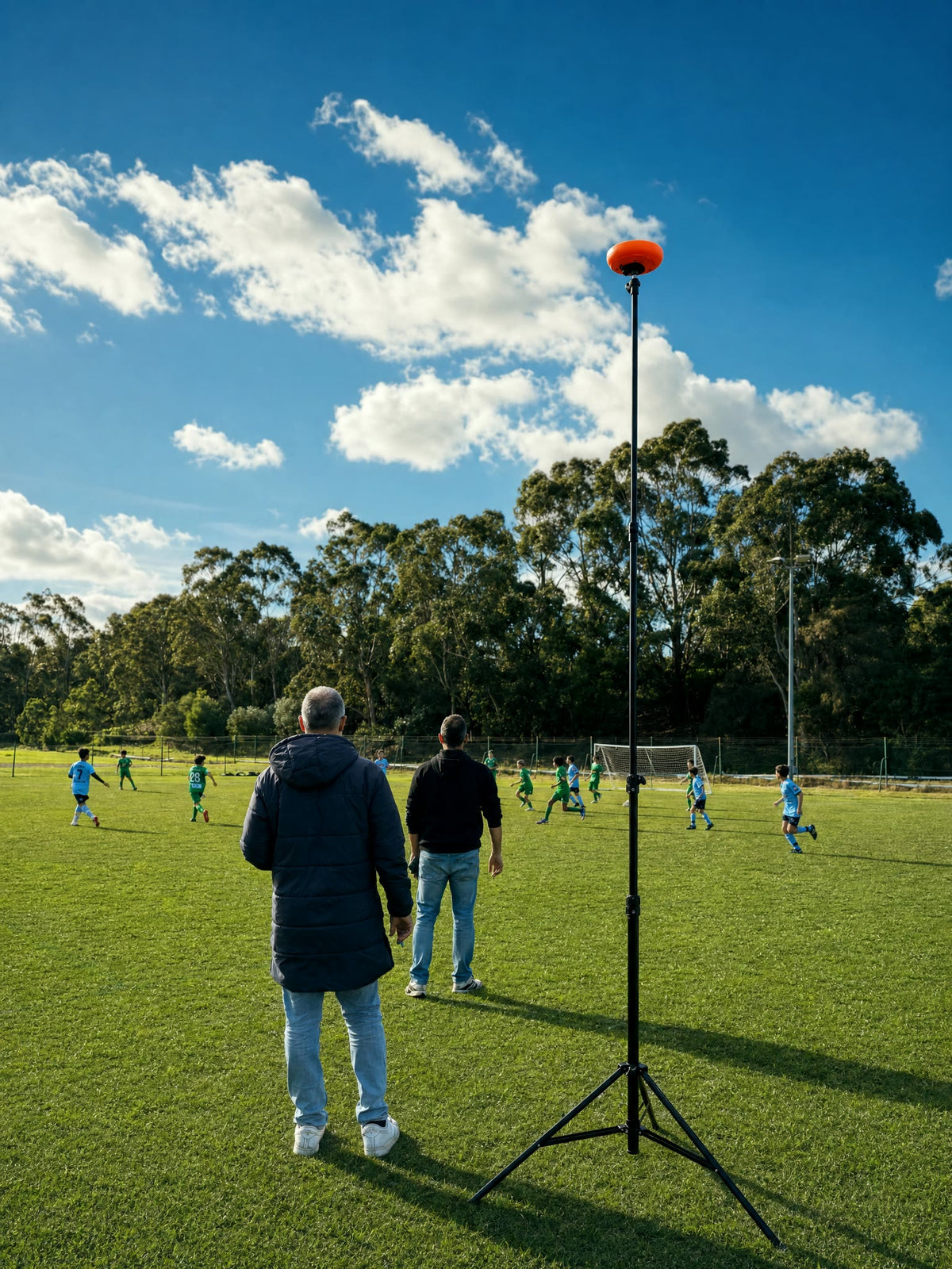 Parents watch from the sidelines while Ballr records the match automatically